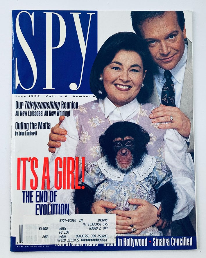 Cover of Spy Magazine from June 1992 featuring Roseanne Barr and Tom Arnold holding a chimpanzee in a dress, emphasizing the playful and satirical take of the publication on celebrity culture.