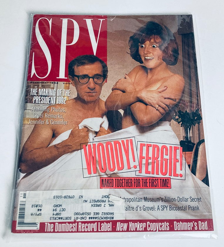 Cover of Spy Magazine November 1992 featuring Woody Allen and Fergie with the headline 'Naked Together for the First Time!'. This vintage magazine emphasizes its provocative and satirical content, exemplifying early '90s pop culture.