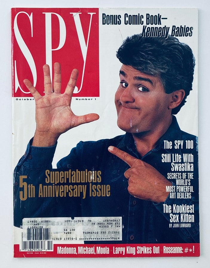 Spy Magazine October 1991 cover featuring Jay Leno, highlighting the 5th Anniversary issue with a bonus comic book, titled 'Kennedy Babies'.