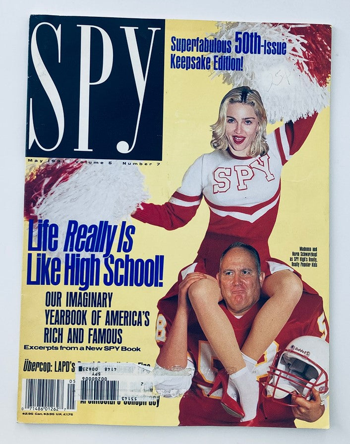 Spy Magazine May 1991 cover featuring Madonna as a cheerleader, showcasing humorous pop culture commentary with a playful image of a football player beneath her.