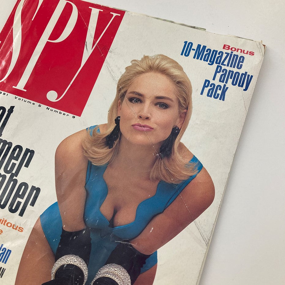 Close-up of the Spy Magazine August 1991 cover, showcasing Sharon Stone wearing a blue swimsuit, emphasizing the provocative portrayal in media.