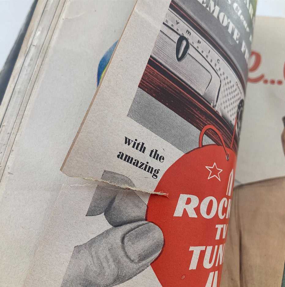Close-up view of VTG Life Magazine April 7 1952 featuring a vintage advertisement partially torn, highlighting the tagline 'with the amazing' and showcasing 1950s design elements.