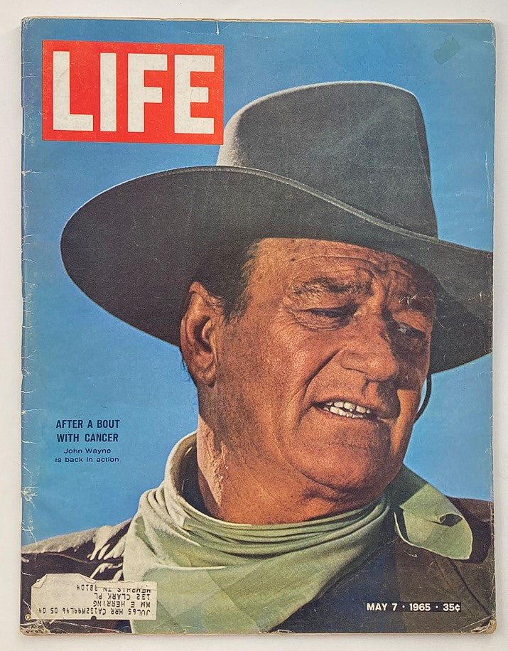Cover of the VTG Life Magazine from May 7, 1965, Volume 58, Issue 18 featuring John Wayne after a bout with cancer, showcasing his iconic look with a hat and bandana.