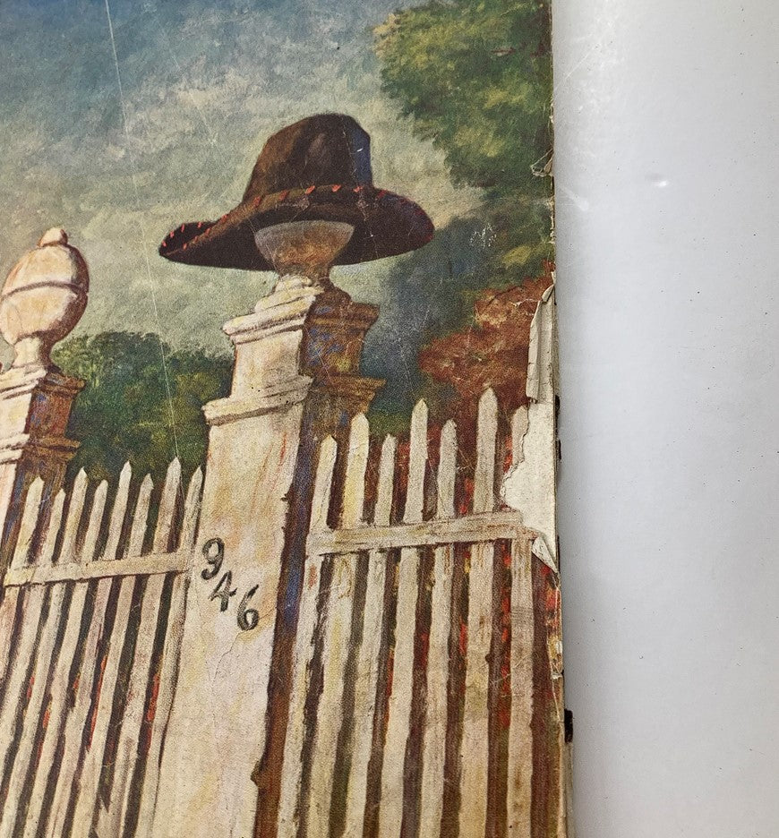 Close-up of the fence and a hat on the cover of The Saturday Evening Post June 23 1951, illustrating the vintage artwork that encapsulates the era.