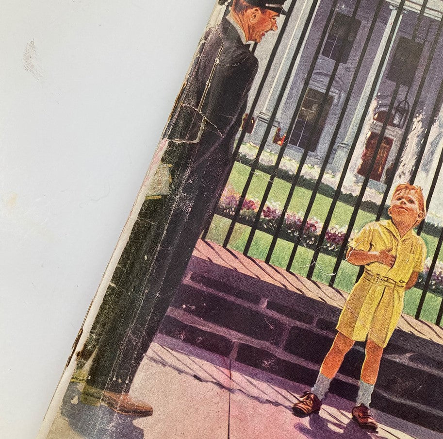 Cover image of The Saturday Evening Post from September 25, 1948 featuring a scene with a child and a guard in front of a historic building. The cover poses the question, 'Is Our Navy Trapped In China?' offering a nostalgic glimpse into past era concerns.