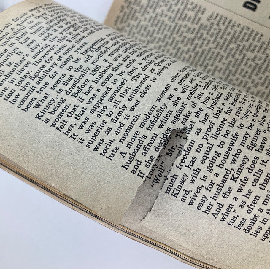 Inside detail of the Vintage True Life Stories Magazine December 1953 Vol 1 #3 showing a page with text and noticeable tear, emphasizing the magazine's vintage character.