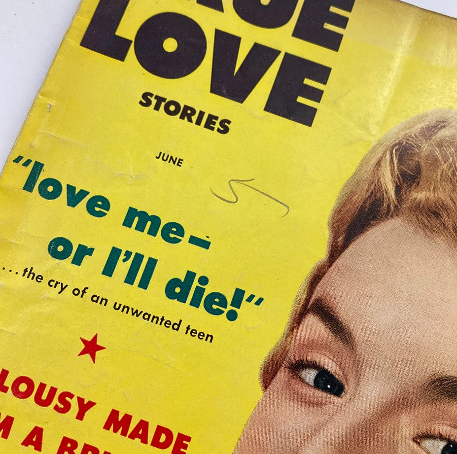 Close-up of VTG True Love Stories Magazine June 1954 Vol 61 #5 showing the title and a prominent tagline 'love me - or I'll die!', emphasizing the magazine's vintage appeal.