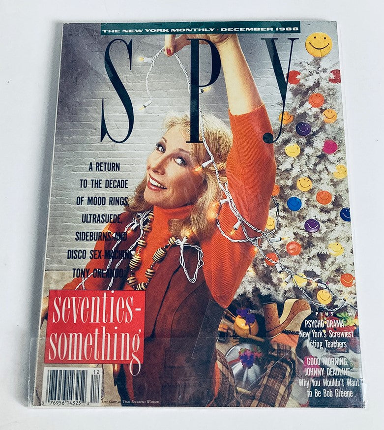 Cover of the December 1988 VTG Spy Magazine featuring Teri Garr styled as 'The Seventies Woman'. The image showcases a festive setting with colorful lights and decor, highlighting a nostalgic theme from the era.