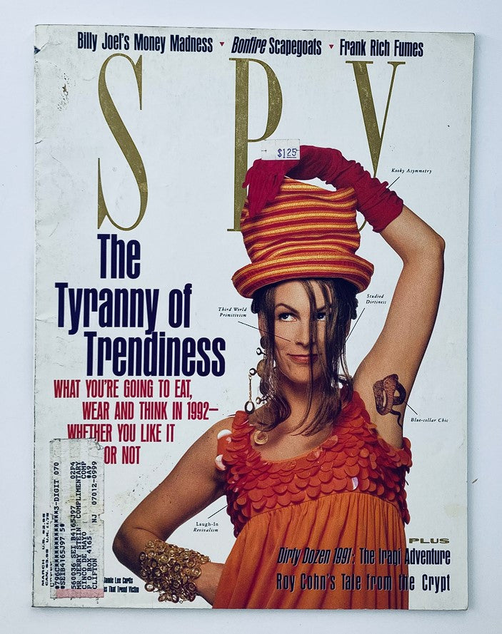 Cover of Spy Magazine March 1991 featuring Jamie Lee Curtis in a playful pose with eye-catching accessories, showcasing the article titled 'The Tyranny of Trendiness'.