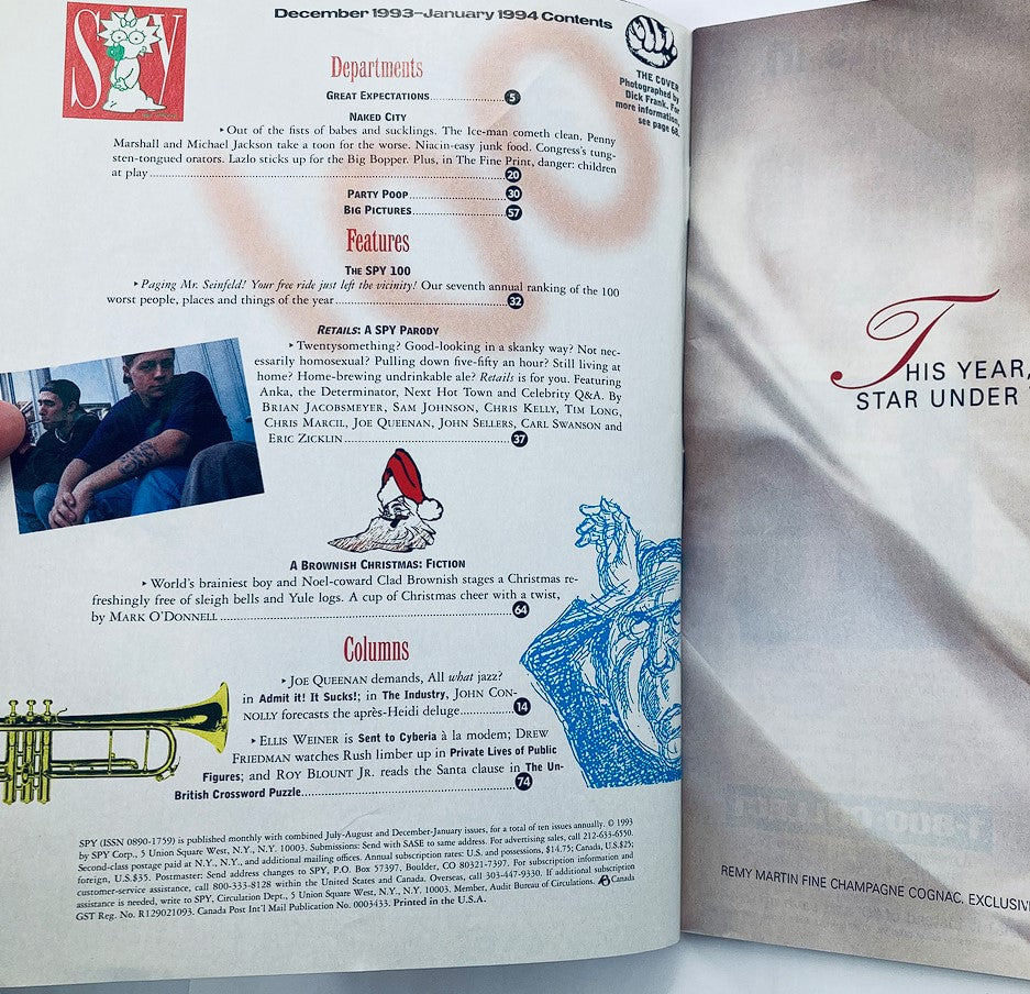 Inside spread of Spy Magazine from December 1993 to January 1994, showcasing the table of contents with features on celebrity culture and political commentary, preserving its unique satirical perspective.