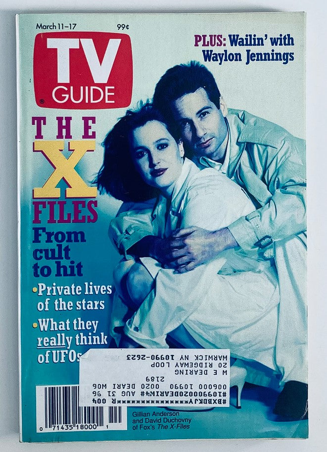 Cover of TV Guide Magazine March 11, 1995 featuring Gillian Anderson and David Duchovny from The X-Files. The magazine highlights the popular sci-fi series, showcasing key elements like private lives of the stars and their views on UFOs.