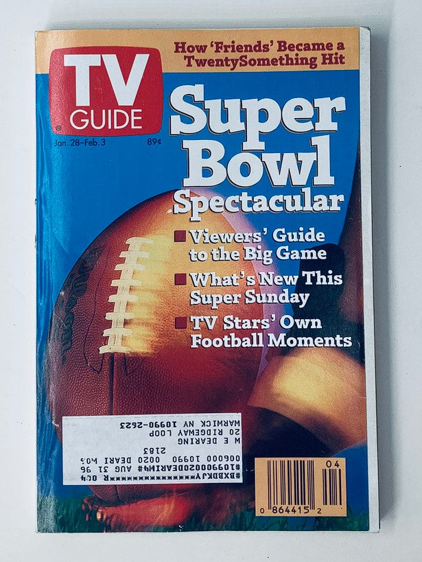 Cover of TV Guide Magazine January 28 1995 Super Bowl Spectacular NY Metro Edition featuring an illustration of a football and articles on viewers' guides, highlights for Super Sunday, and TV stars' football moments.