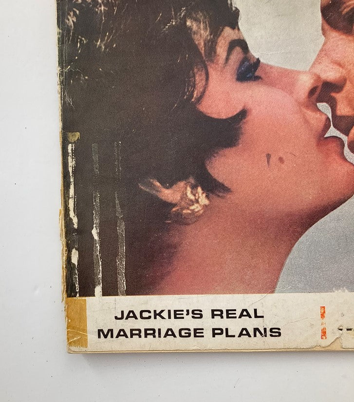 Close-up view of Elizabeth Taylor and Richard Burton on the cover of VTG Modern Screen Magazine May 1967 highlighting the intimate pose.