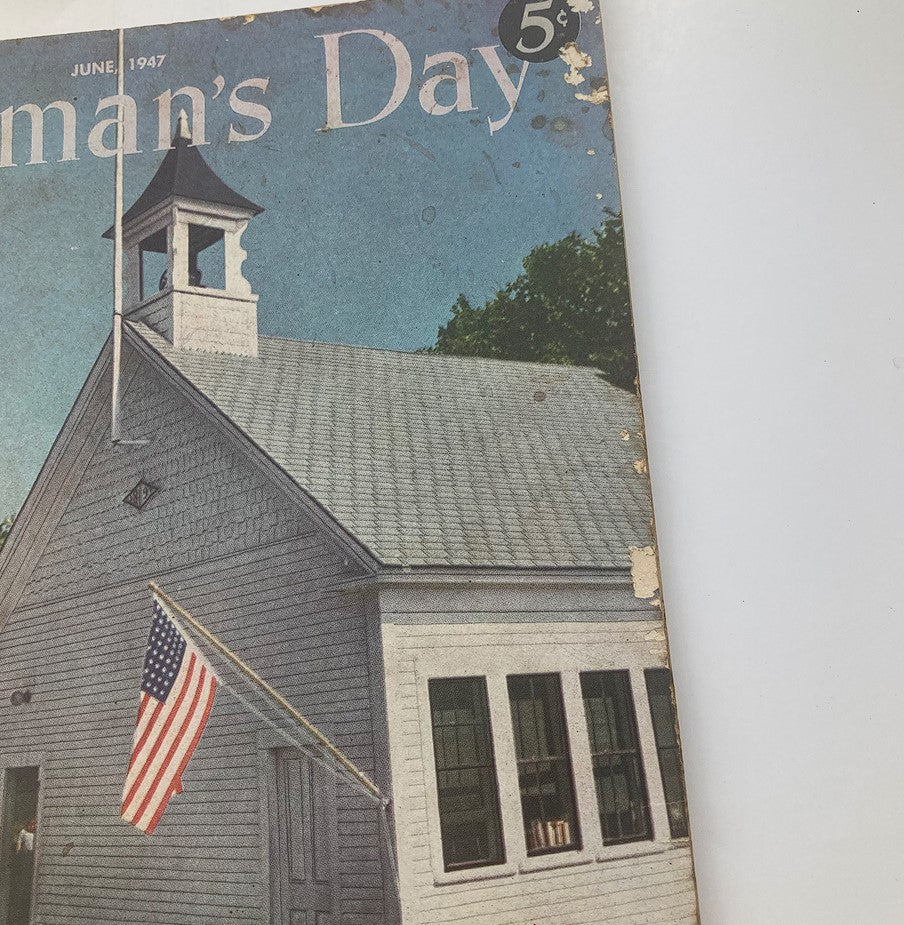 Cover of VTG Woman's Day Magazine June 1947 featuring an illustration of a building with an American flag, reflecting vintage design and historical context.