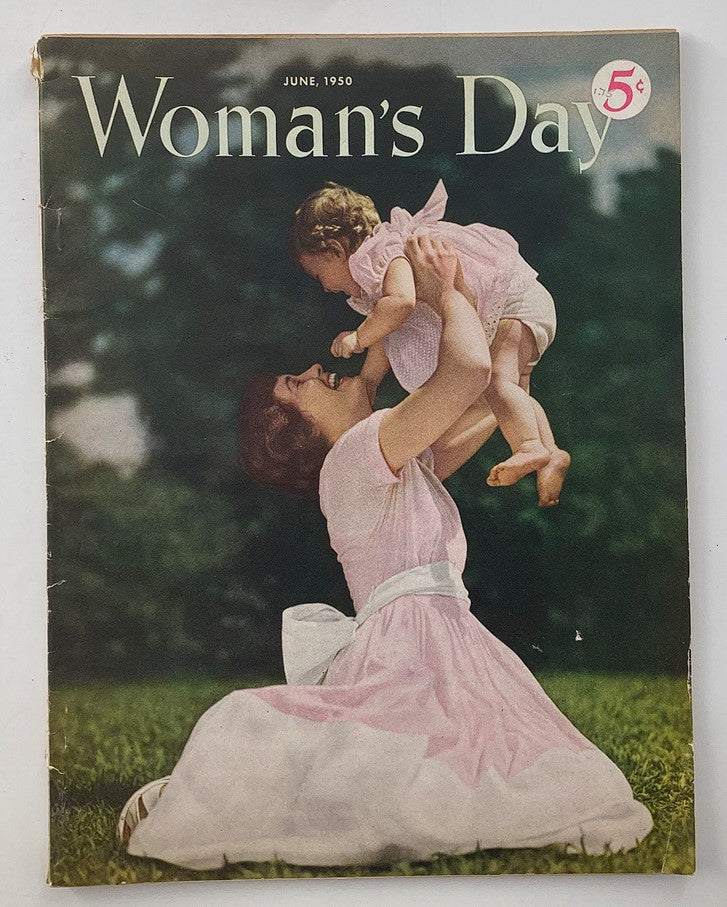 Cover of VTG Woman's Day Magazine June 1950 featuring a mother lifting her child in a pink dress on a grassy field. Vintage magazine showcasing nostalgic imagery from the 1950s.