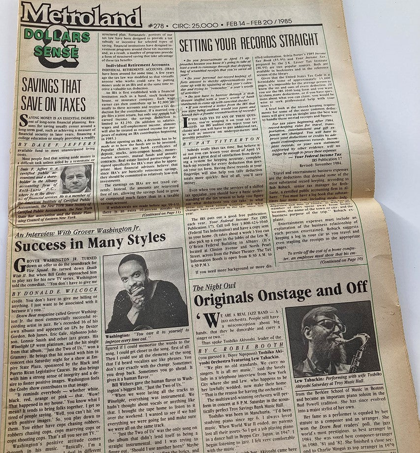 February 14, 1985 issue of VTG Metroland Newspaper #278, featuring articles about Grover Washington Jr. and Lew Tabackin, with sections on taxes and music performance.