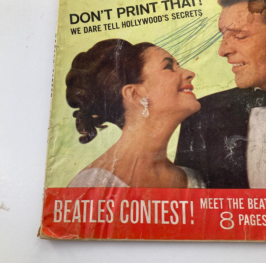 Close-up of the cover of VTG Modern Screen Magazine June 1964 featuring Liz Taylor and Richard Burton, with details on the magazine's content about Hollywood secrets and Beatles contest.