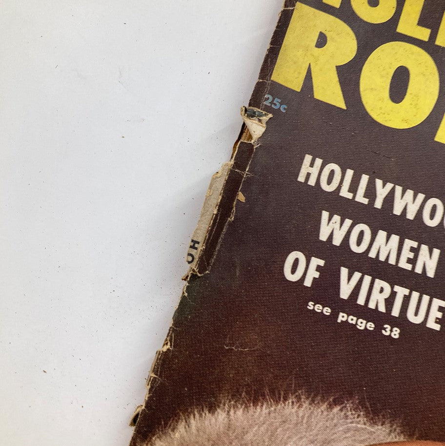 Detail view of the spine of VTG Hollywood Romances Magazine 1956 No. 9 highlighting wear and the title, emphasizing its vintage appeal.