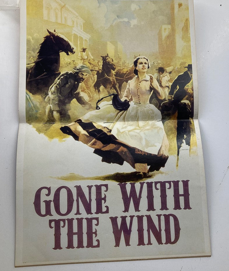 Vintage poster from the December 1989 issue of Hollywood Studio Magazine Then & Now featuring iconic imagery from Gone With the Wind, spotlighting the classic film's historical significance.