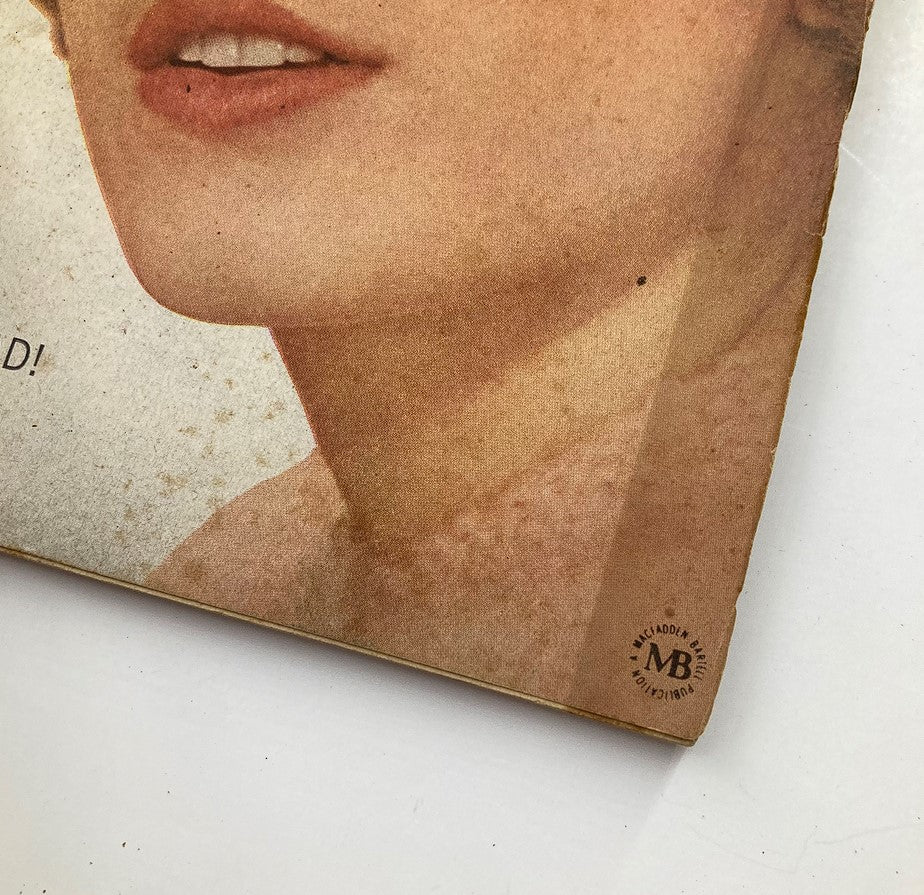 Close-up of the bottom corner of VTG TV Radio Mirror Magazine April 1964 highlighting the texture and publisher's mark.