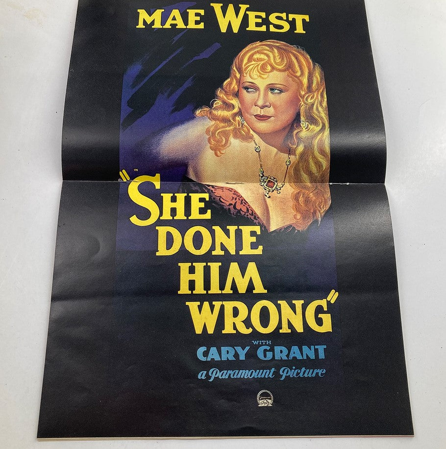 Poster of Mae West in 'She Done Him Wrong' featured in Hollywood Studio Magazine Then & Now June 1990, highlighting historical cinema and iconic film stills.