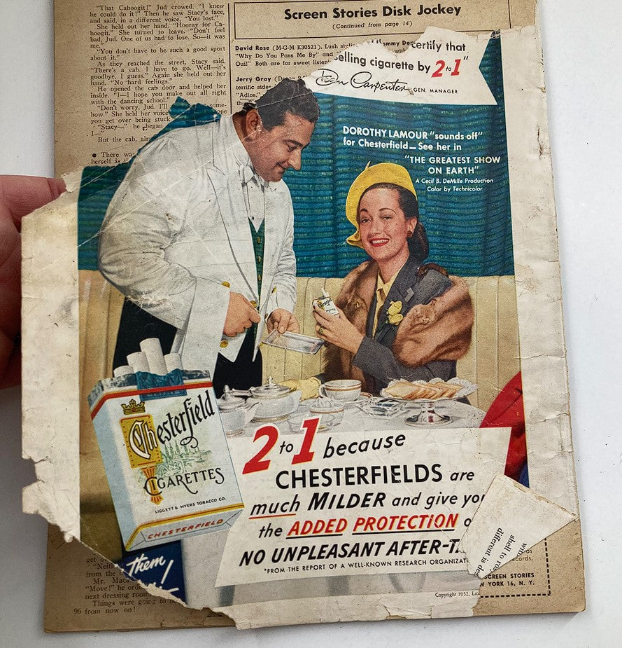 Vintage advertisement from Screen Stories magazine May 1952, Vol 47 #5 featuring an elegant scene with a man in a tuxedo serving food and a woman in a stylish outfit, promoting Chesterfield cigarettes with the tagline about its mildness and added protection.