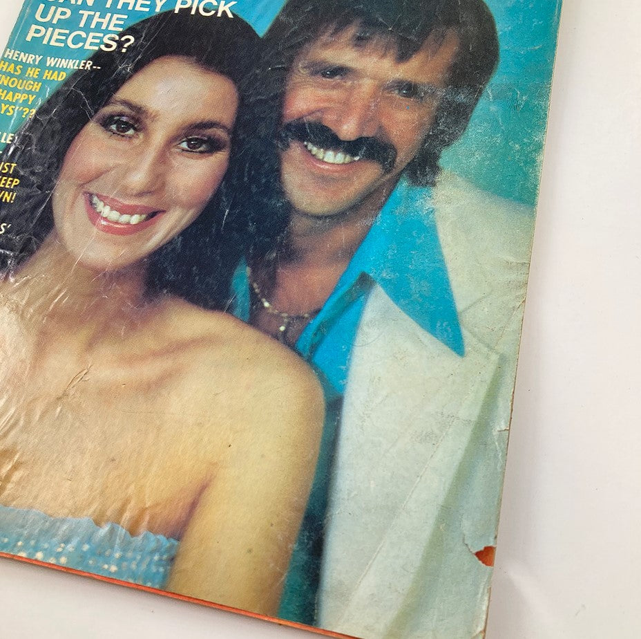 Cover of Rona Barrett's Hollywood Magazine November 1976 featuring Sonny & Cher, showcasing their glamorous appearance.