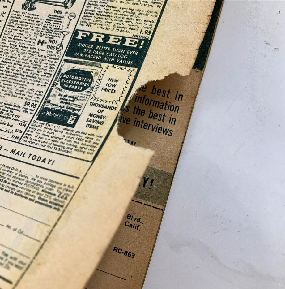 Close-up of vintage advertisement and damaged edge from VTG Rod & Custom Magazine August 1963 Vol 11 #4, showcasing automotive accessories catalog information.