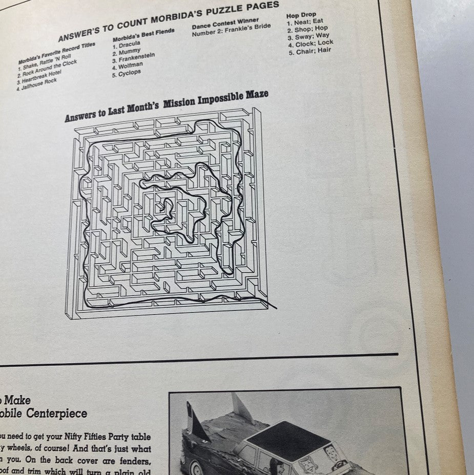 Vintage VTG Dynamite Magazine 1976 No. 24 Elvis Presley - Page featuring answers to puzzles, including a maze and record titles from the magazine.