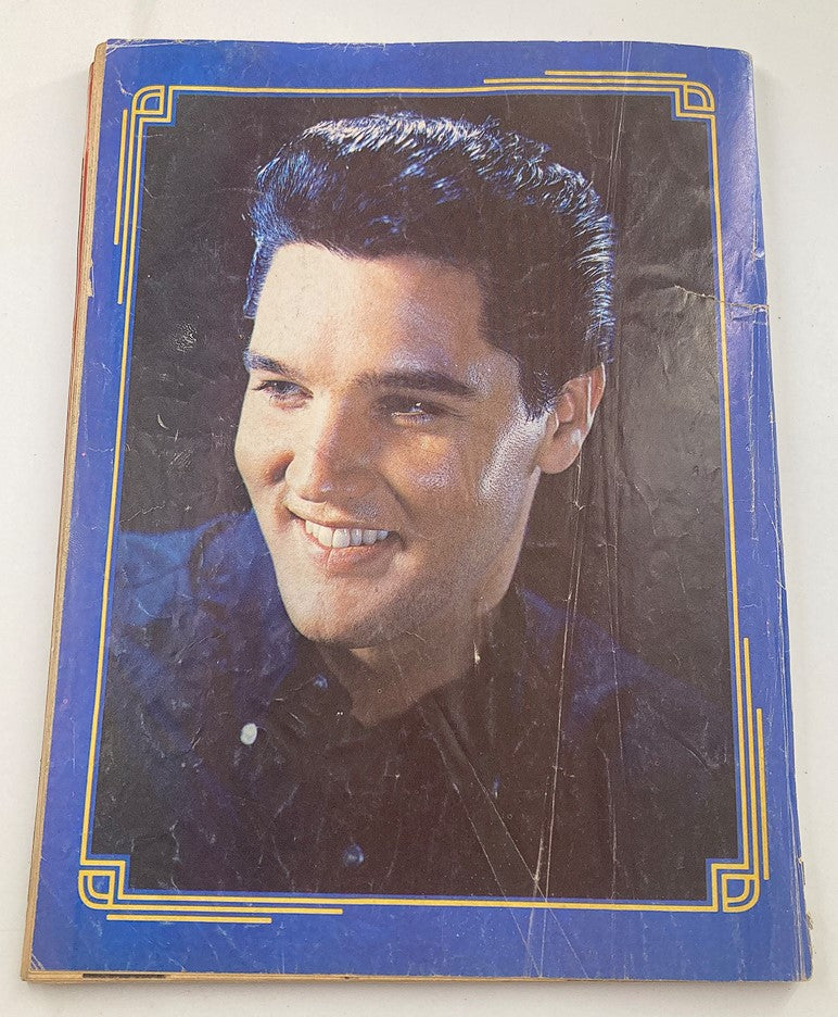 Cover of the VTG Photoplay Magazine 1977 Elvis Presley A Tribute showcasing a smiling portrait of Elvis Presley with vintage magazine wear.
