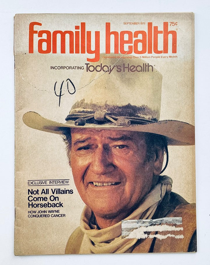 Cover of VTG Family Health Magazine September 1976 featuring an article 'How John Wayne Conquered Cancer', showing a close-up of John Wayne in a cowboy hat, highlighting the exclusive interview and damaged condition of the magazine.