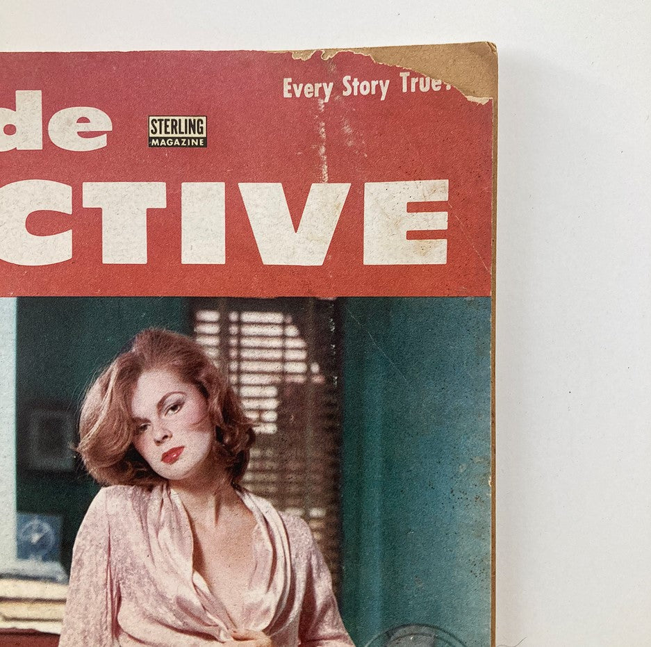 Close-up of the VTG Homicide Detective Magazine February 1956 cover highlighting the title and a striking image of a woman.