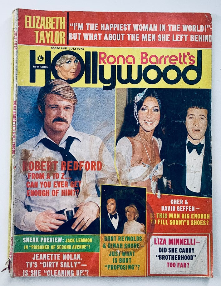 Cover of VTG Rona Barrett's Hollywood Magazine from July 1974 featuring Robert Redford, Elizabeth Taylor, and Cher. This collectible magazine showcases vintage Hollywood glamour and is a must-have for fans and collectors.