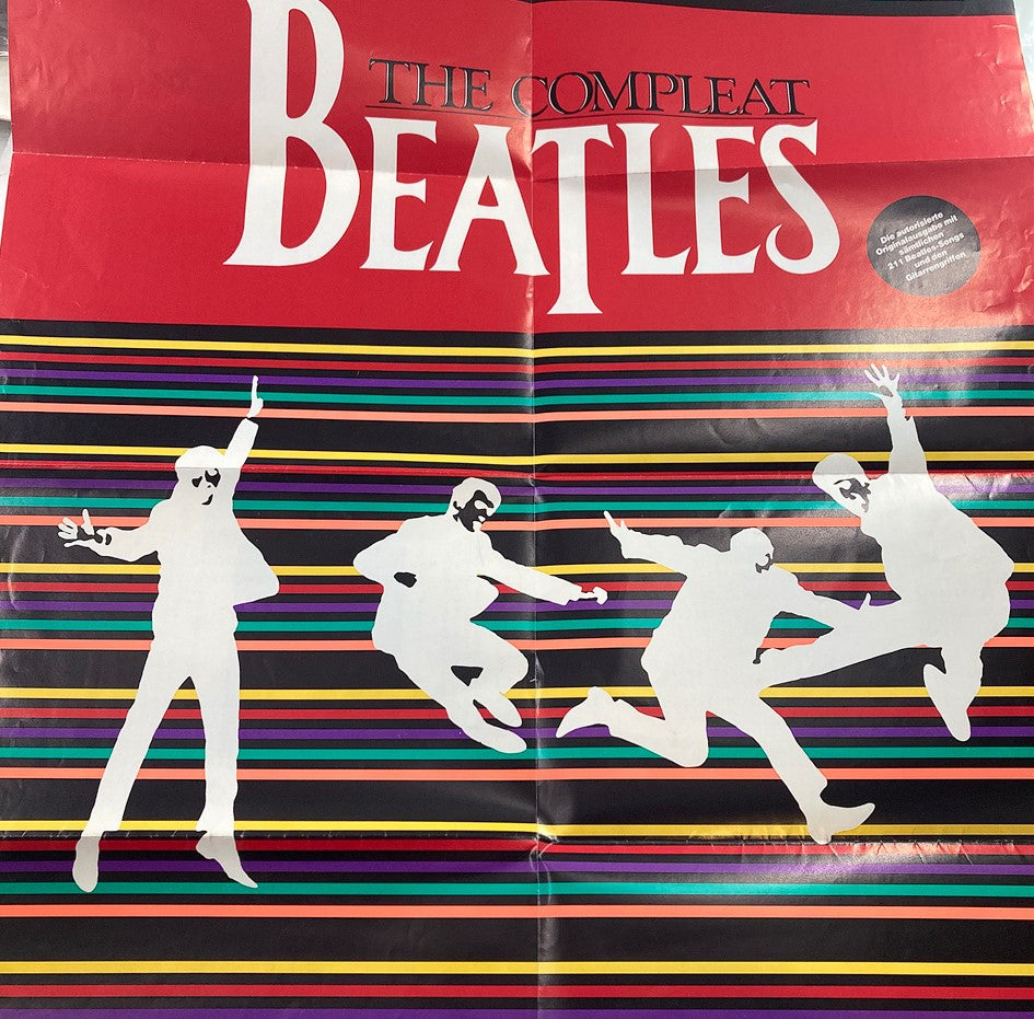 'The Compleat Beatles' poster showcasing a vibrant design with Beatles silhouettes, reflecting the artistic style of the band.