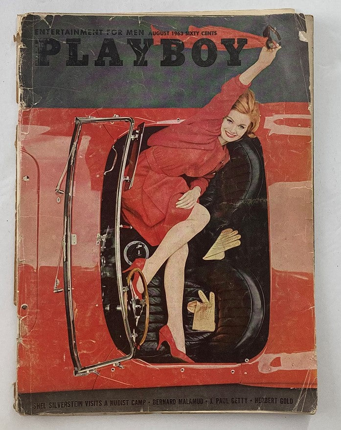 Cover of Playboy Magazine August 1963 featuring Playmate Phyllis Sherwood, showcasing iconic vintage art style with a red and black color scheme.