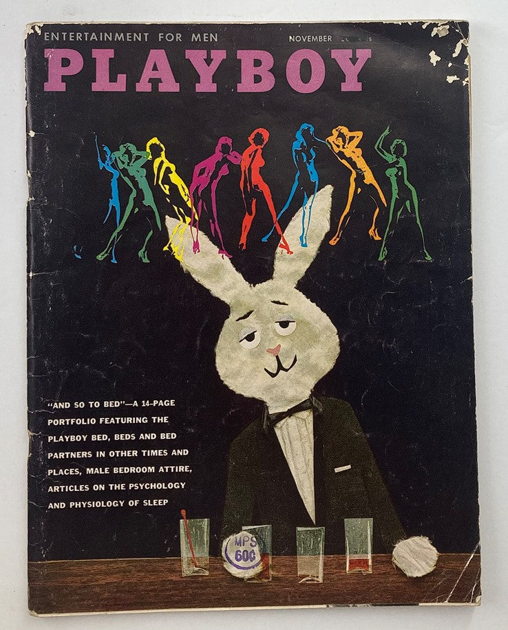 Vintage Playboy Magazine November 1959 cover featuring a playfully illustrated rabbit in a tuxedo, showcasing vibrant colors and retro designs.