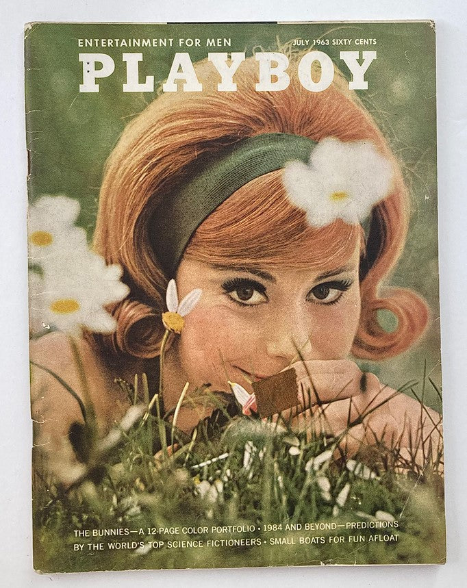 VTG Playboy Magazine July 1963 featuring Carrie Enwright on the cover, showcasing vintage design elements and a charming outdoor scene.