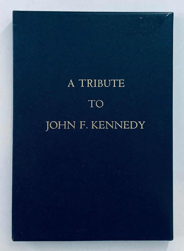 Cover of VTG 1964 A Tribute To John F. Kennedy featuring a blue background with gold lettering.