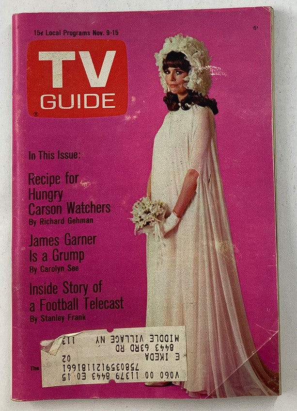TV Guide Magazine November 9, 1968, issue number 815 featuring a woman in a vintage dress with floral accessories on the cover, highlighting the popular culture of the late 1960s.