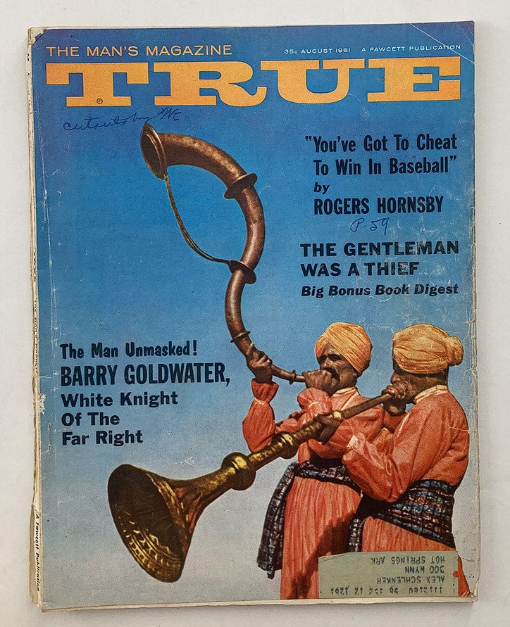 Vintage magazine cover from August 1961 titled 'VTG True The Man's Magazine' featuring Barry Goldwater with the subtitle 'The Man Unmasked'. The cover showcases an illustration of two musicians dressed in traditional attire playing horns.