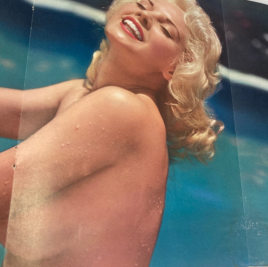 Centerfold from VTG Playboy Magazine December 1956, featuring Playmate Lisa Winters in a classic pin-up pose by the pool.