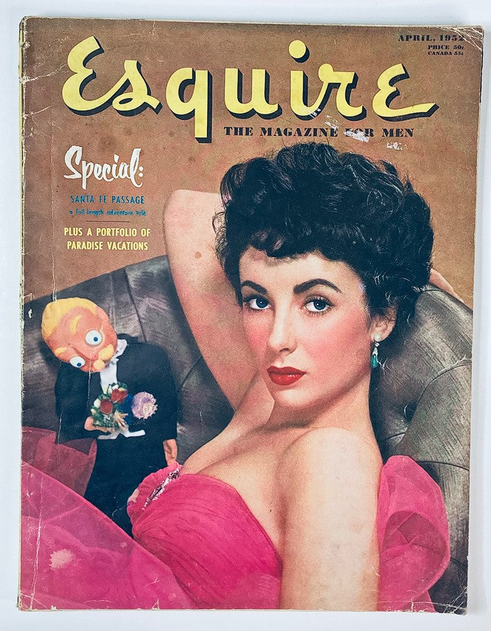 VTG Esquire Magazine April 1952 No. 221 featuring Elizabeth Taylor on the cover, showcasing her iconic beauty in a glamorous pink dress with a vintage design.