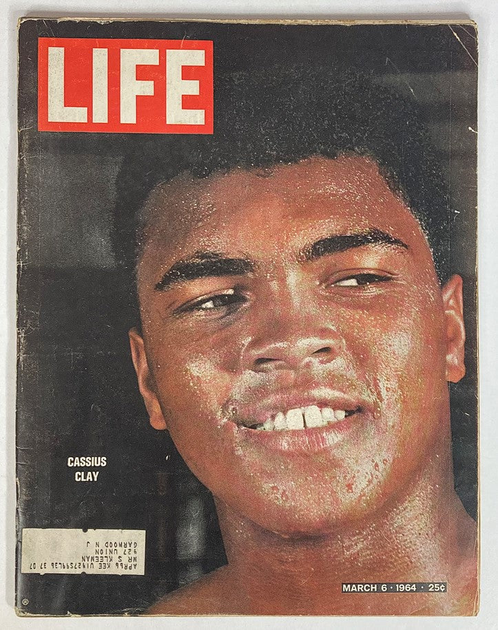 VTG Life Magazine March 6 1964 featuring Cassius Clay on the cover, showcasing the iconic boxer with a bright smile and athlete's glow.
