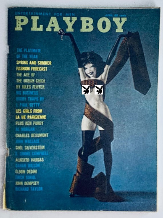 VTG Playboy Magazine April 1961 cover featuring the iconic centerfold with Nancy Nielsen, showcasing vintage Playboy branding and design.