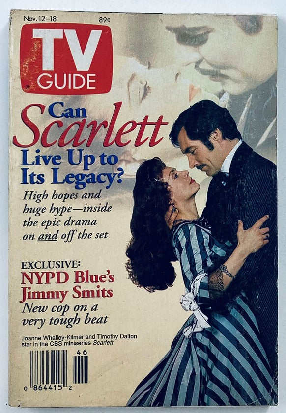 TV Guide Magazine from November 12-18, 1994, featuring an image of Joanne Whalley-Kilmer and Timothy Dalton in a romantic scene, alongside the question, 'Can Scarlett Live Up to Its Legacy?' The magazine highlights a feature on the CBS miniseries 'Scarlett' and covers NYPD Blue's Jimmy Smits, making it a collectible item for vintage magazine enthusiasts.