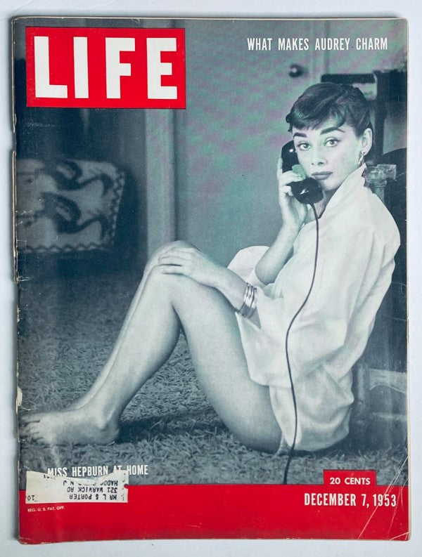 Vintage Life Magazine cover from December 7, 1953 featuring Audrey Hepburn, showcasing her charm and elegance.