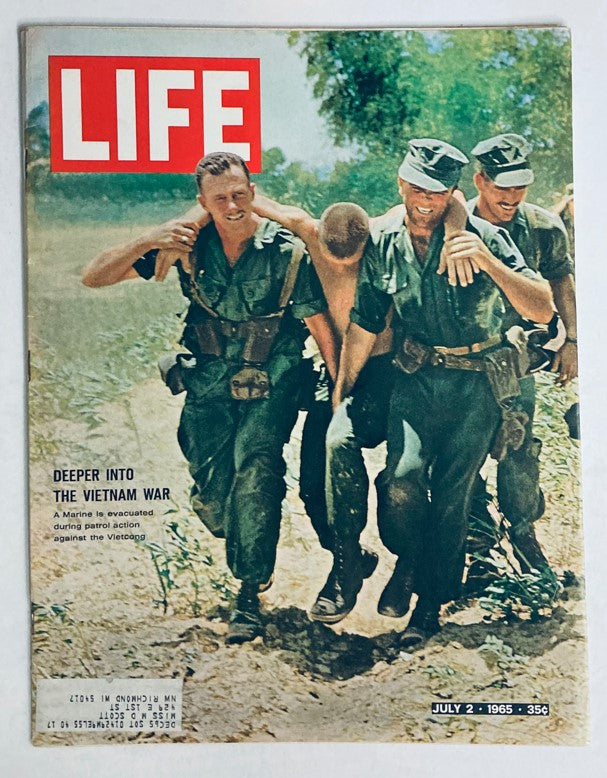 Cover of VTG Life Magazine July 2, 1965, featuring soldiers during the Vietnam War with the headline 'Deeper Into The Vietnam War.' This vintage magazine offers a glimpse into the events of the era.