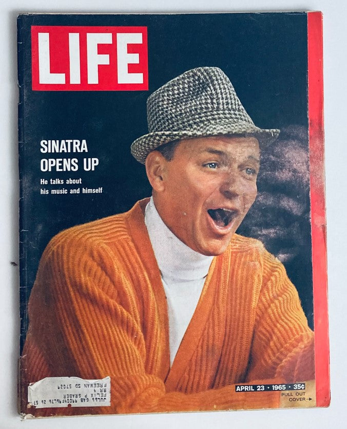 Cover of VTG Life Magazine April 23, 1965 featuring Frank Sinatra, wearing a stylish hat and orange sweater, captioned 'Sinatra Opens Up'.