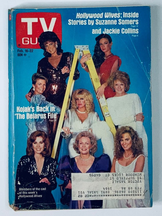 TV Guide Magazine from February 16, 1985, featuring Suzanne Somers on the cover, highlighting Hollywood Wives and showcasing a group of iconic television personalities in glamorous attire.