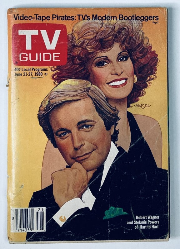 Cover of TV Guide Magazine from June 21, 1980, featuring Stefanie Powers and Robert Wagner, highlighting the theme 'Video-Tape Pirates: TV's Modern Bootleggers'. This vintage magazine captures the essence of television history and is a collectible item for fans of the era.